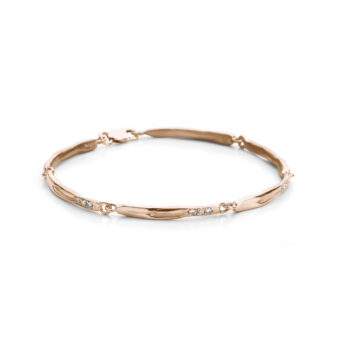 Handgemaakte schakelarmband in roségoud met drie diamanten van D-kleur en VVS-kwaliteit.